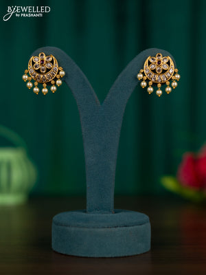Antique earrings chandbali design with ruby & cz stones and pearl hangings