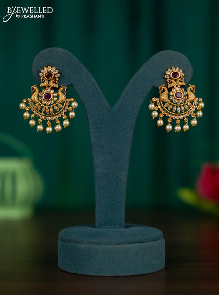 Antique earrings peacock design with ruby & cz stones and pearl hangings