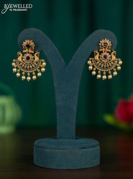 Antique earrings peacock design with kemp & cz stones and pearl hangings