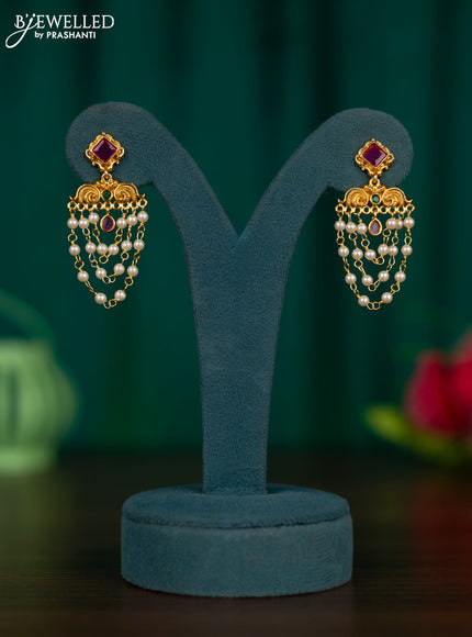 Antique earrings with kemp stones and pearl hangings