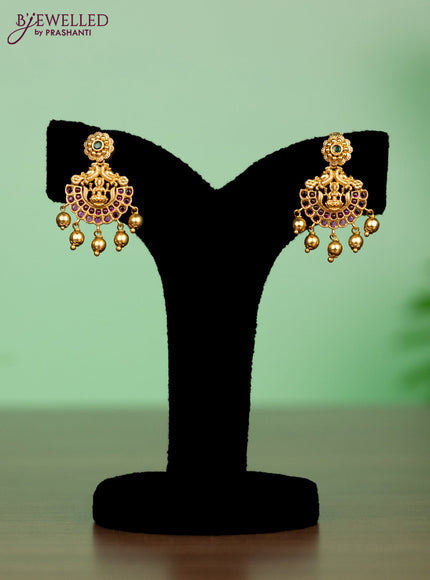 Antique attigai necklace lakshmi pendant with kemp stones and golden beadds hangings