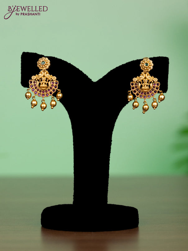 Antique attigai necklace lakshmi pendant with kemp stones and golden beadds hangings