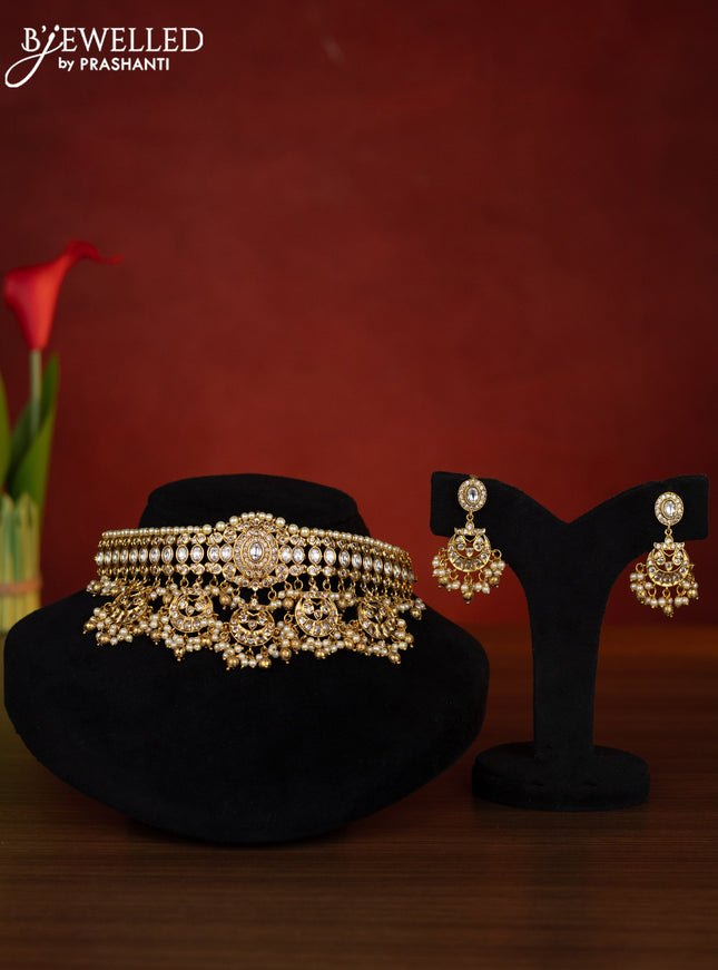 Antique choker chandbali design with kemp & kundan cz stones and pearl & golden beads hangings