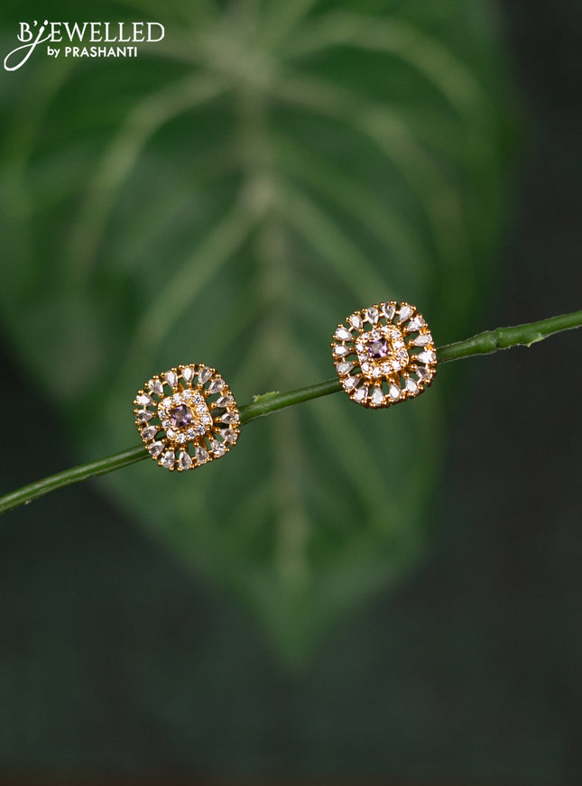 Zircon earrings with purple and cz stones in gold finish