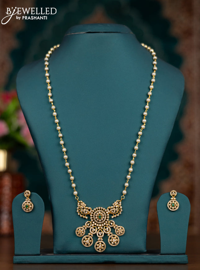 Pearl necklace with emerald and cz stones