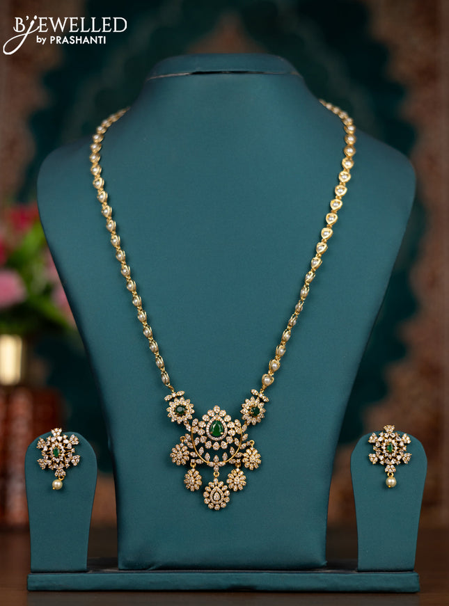 Pearl necklace with emerald and cz stones