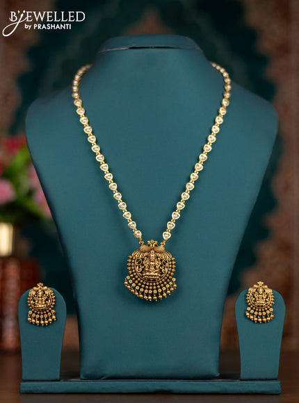 Pearl necklace with lakshmi pendant and golden beads hangings