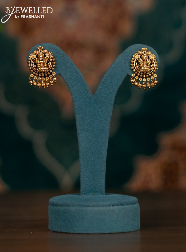 Pearl necklace with lakshmi pendant and golden beads hangings