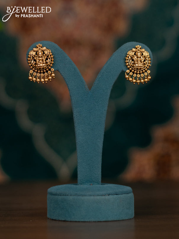 Pearl necklace with lakshmi pendant and golden beads hangings