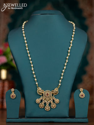 Pearl necklace with ruby and cz stones
