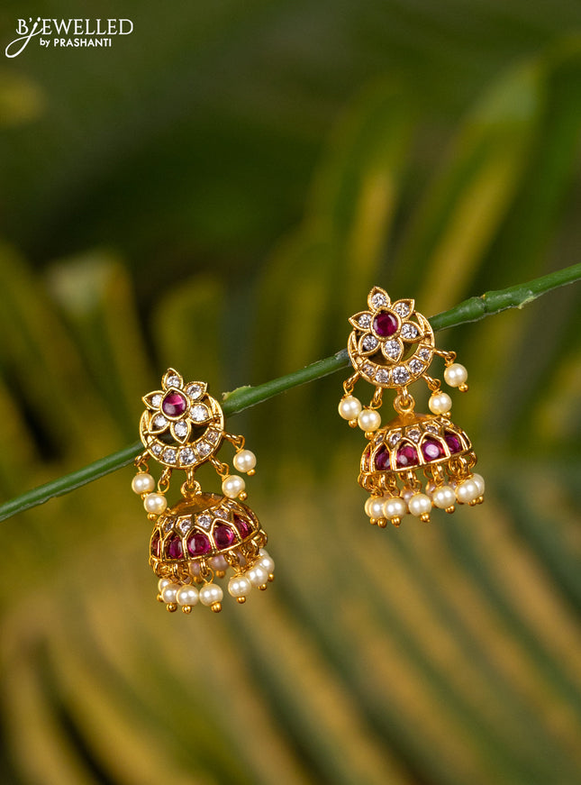Antique jhumka chandbali design with pink kemp & cz stones and pearl hangings