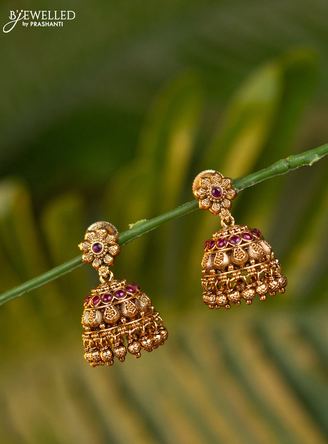 Antique jhumka with pink kemp stones and golden beads hangings