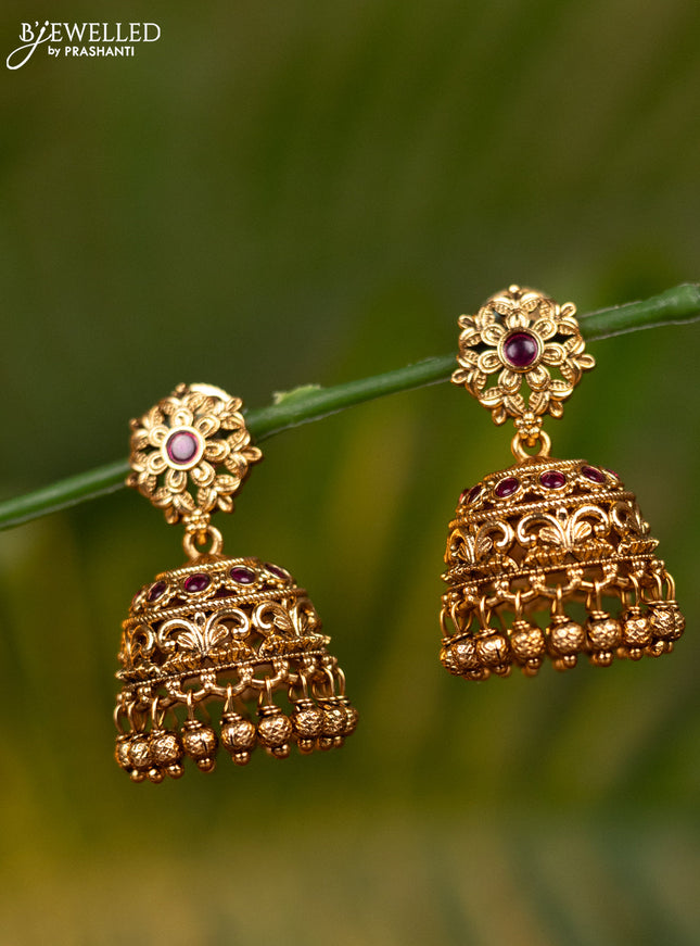 Antique jhumka with pink kemp stones and golden beads hangings