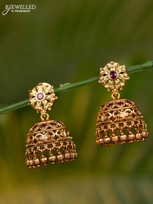Antique jhumka with pink kemp stones and golden beads hangings