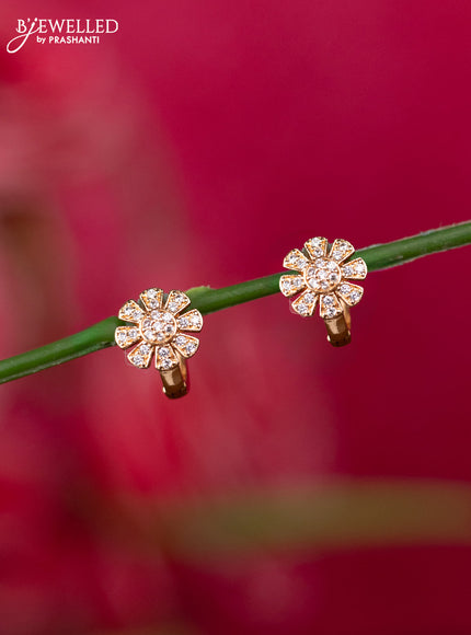 Rosel gold hanging type earrings with floral design and cz stones