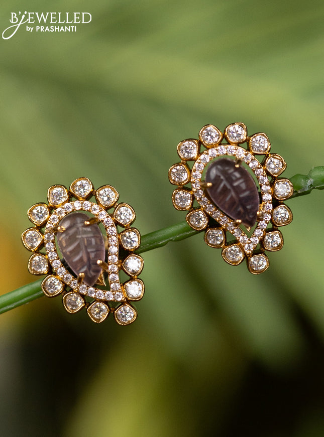 Antique earrings with purple and cz stones