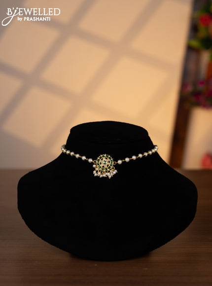 Pearl choker with green jadau kundan stones and pearl hangings without earrings