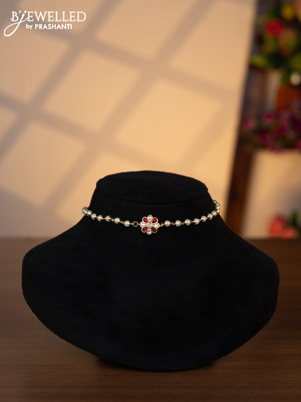 Pearl choker floral design with pink jadau kundan stones without earrings