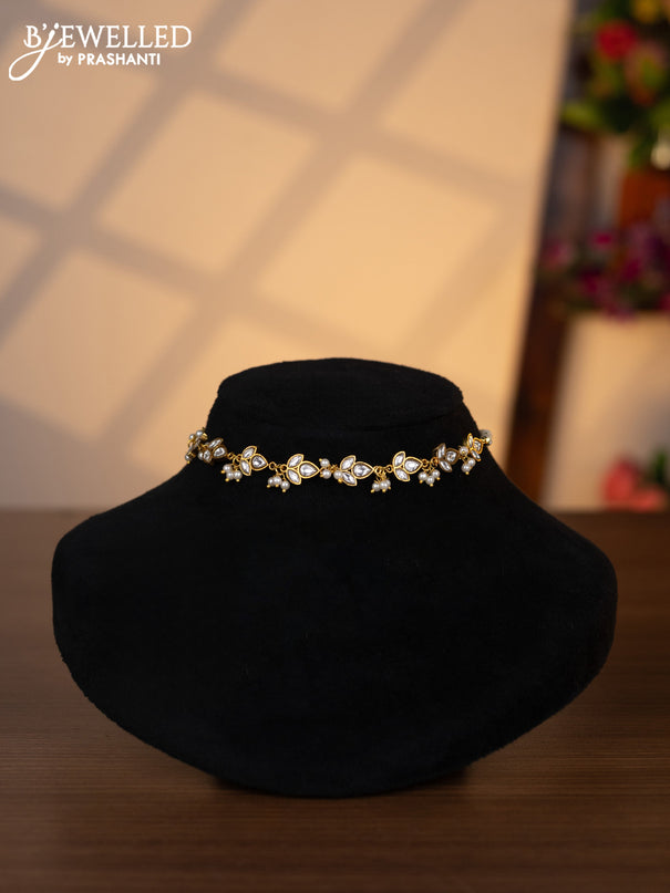 Pearl choker with kundan stones and pearl hangings without earrings