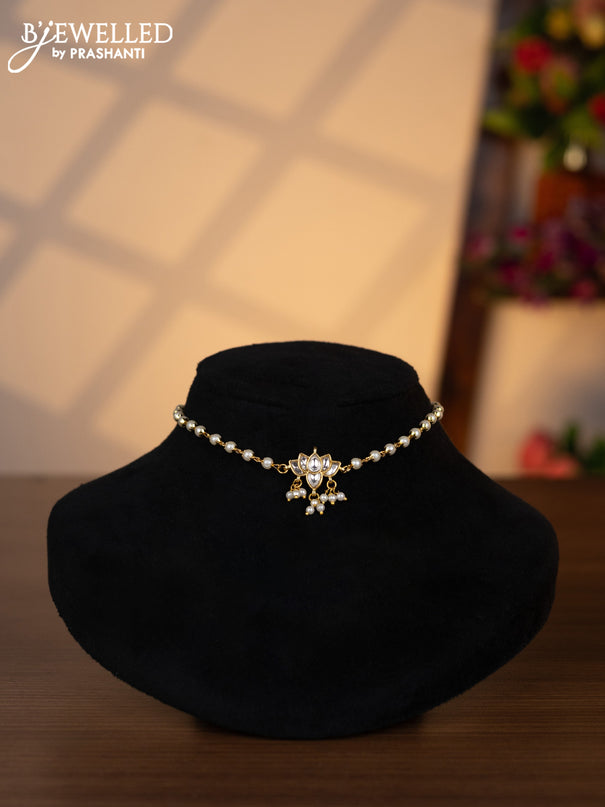Pearl choker lotus design with kundan stones and pearl hangings without earrings