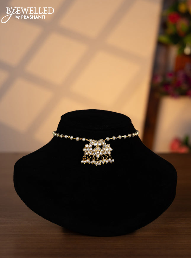 Pearl choker with kundan stones and pearl hangings without earrings