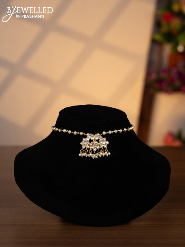 Pearl choker with kundan stones and pearl hangings without earrings