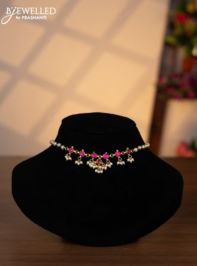 Pearl choker with pink jadau stones and pearl hangings without earrings