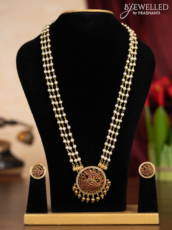 Pearl triple layer haaram peacock design with kemp & cz stones and golden beads hangings