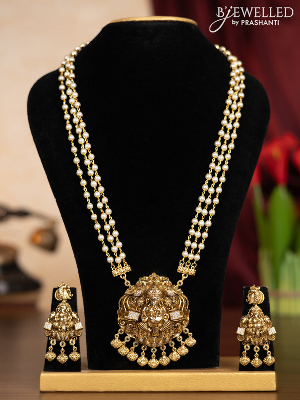 Pearl triple layer haaram ganesha pendant with kemp & cz stones and hangings