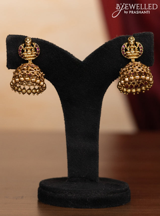 Pearl triple layer haaram lakshmi pendant with pink kemp stones and golden beads hangings