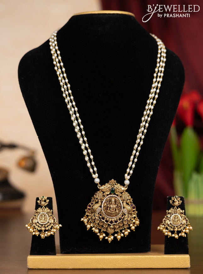 Pearl triple layer haaram lakshmi pendant with kemp & cz stones and pearl & golden beads hangings