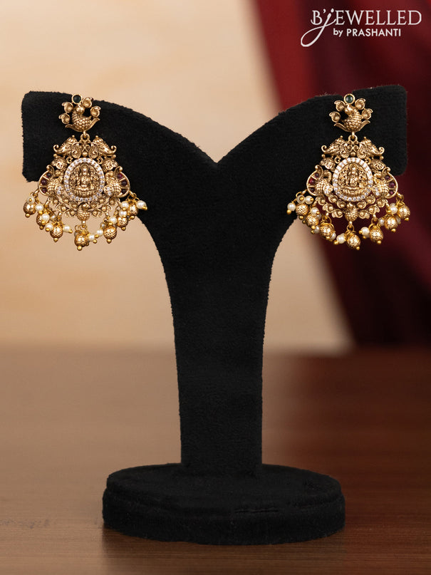 Pearl triple layer haaram lakshmi pendant with kemp & cz stones and pearl & golden beads hangings