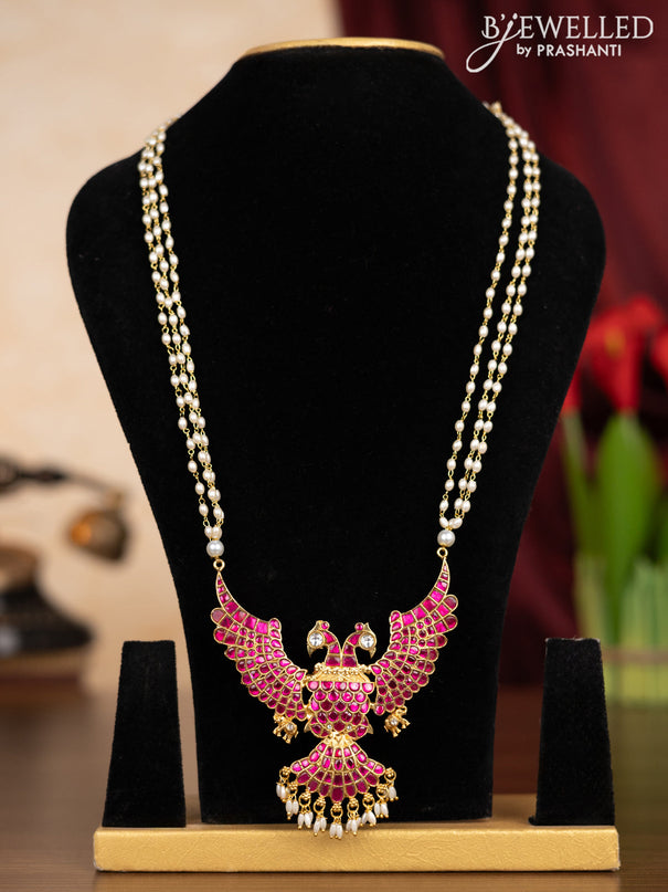 Pearl triple layer haaram garuda pendant with pink jadau kundan stones andd pearl hangings without earrings