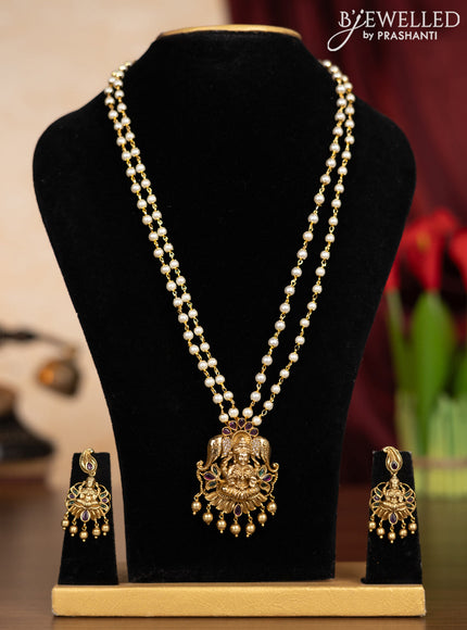 Pearl double layer haaram with kemp & cz stones and golden beads hangings