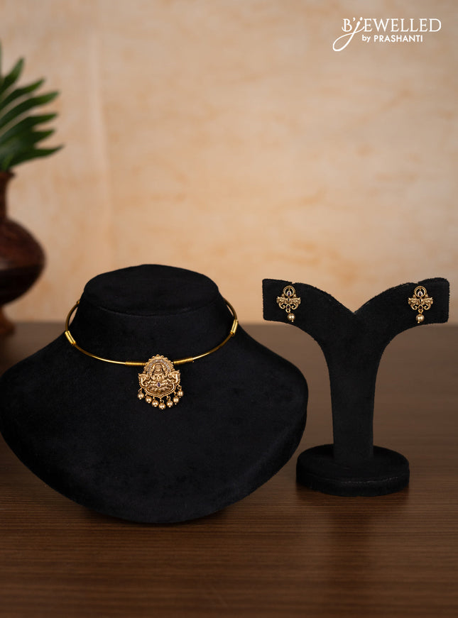 Antique ring type choker lakshmi pendant with ruby & cz stones and golden beads hangings