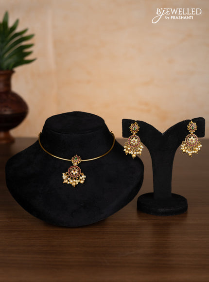 Antique ring type choker with kemp & cz stones and pearl & golden beads hangings