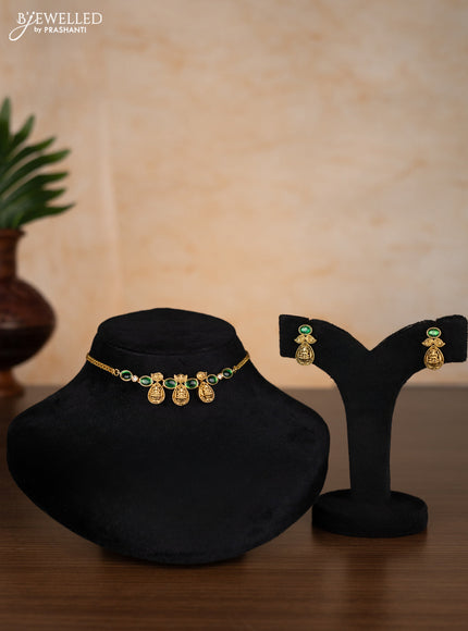 Antique choker lakshmi design with emerald and kundan stones