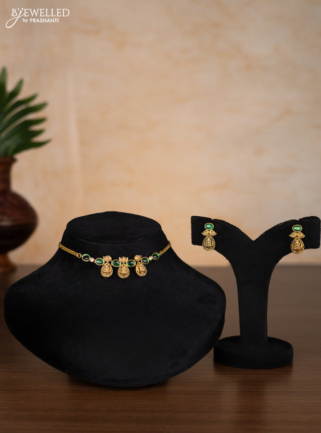 Antique choker lakshmi design with emerald and kundan stones