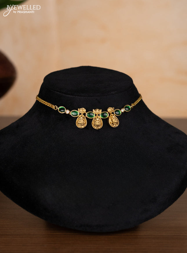 Antique choker lakshmi design with emerald and kundan stones