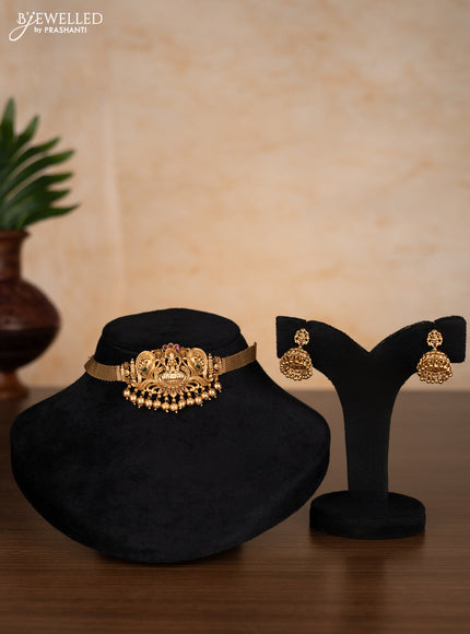 Antique choker lakshmi design with kemp stones and golden beads hangings