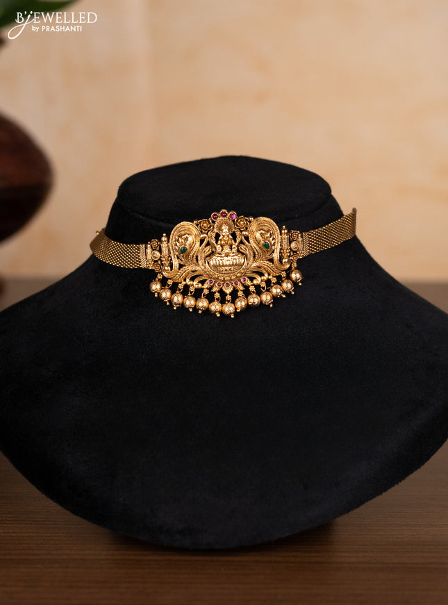 Antique choker lakshmi design with kemp stones and golden beads hangings