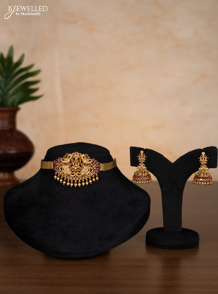 Antique choker lakshmi design with ruby stones and golden beads hangings