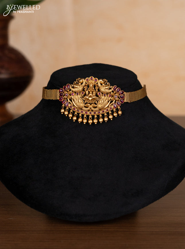 Antique choker lakshmi design with ruby stones and golden beads hangings
