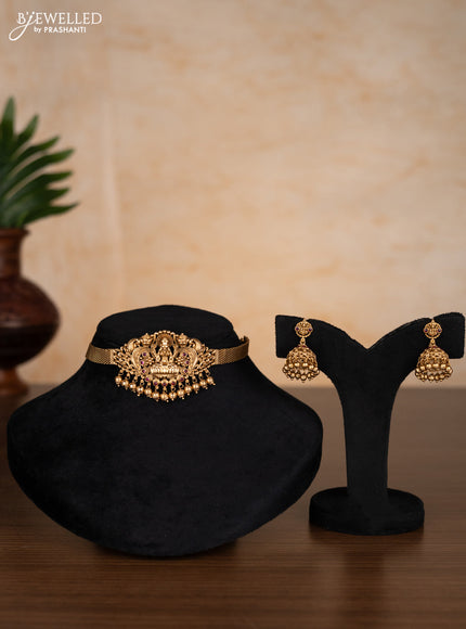 Antique choker lakshmi design with ruby stones and golden beads hangings