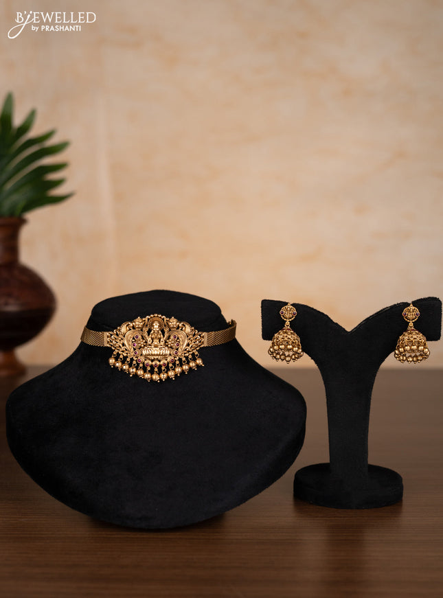 Antique choker lakshmi design with ruby stones and golden beads hangings