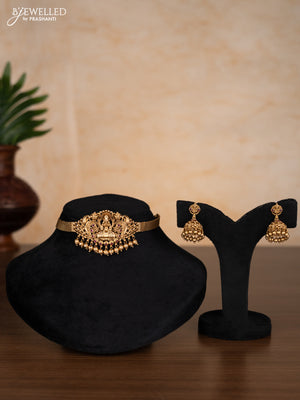 Antique choker lakshmi design with ruby stones and golden beads hangings