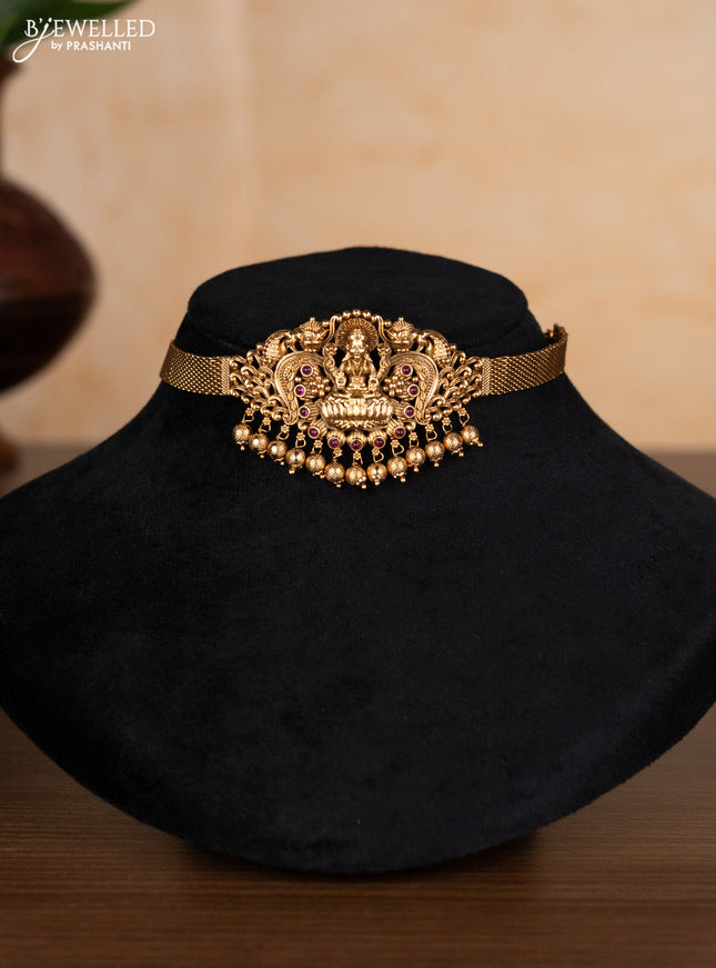 Antique choker lakshmi design with ruby stones and golden beads hangings