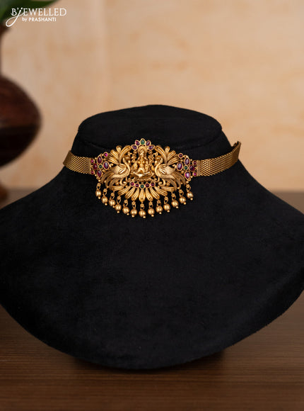 Antique choker lakshmi design with kemp stones and golden beads hangings