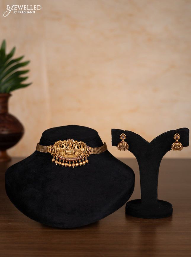 Antique choker lakshmi design with kemp stones and golden beads hangings