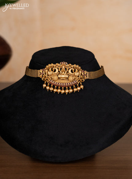Antique choker lakshmi design with kemp stones and golden beads hangings
